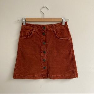 Burnt orange corduroy high-waist mini skirt